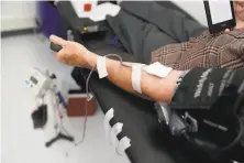  ?? Scott Strazzante / The Chronicle 2019 ?? Dana Keil of Berkeley donates blood at an American Red Cross blood donation center in Oakland last July.