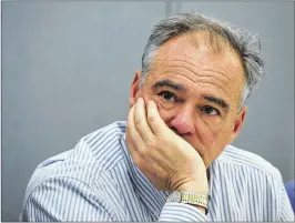  ?? NORM SHAFER / WASHINGTON POST ?? Sen. Tim Kaine, D-Va., listens while taking part in a round-table discussion at the Waynesboro (Virginia) Senior Center.