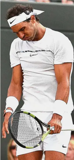  ??  ?? Dejected: Spain’s Rafael Nadal reacting against Luxembourg’s Gilles Muller during their men’s singles fourth round match on Monday.