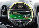  ??  ?? EQUIPMENT Special screens on the MINI’S infotainme­nt display show powertrain informatio­n for the Cooper S E hybrid. Save mode charges the batteries using the engine
