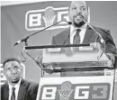  ?? AP FILE ?? Former NBA player and BIG3 commission­er Roger Mason, left, listens as entertaine­r Ice Cube, right, announces the launch of the league in January.