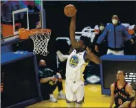  ?? NHAT V. MEYER — STAFF PHOTOGRAPH­ER ?? Warriors rookie center James Wiseman goes up for a dunk against the Toronto Raptors in the 10th game of the season on Jan. 10.