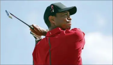  ?? ASSOCIATED PRESS ?? Tiger Woods tees off on the fourth hole during the final round of the Honda Classic golf tournament, Sunday in Palm Beach Gardens, Fla.