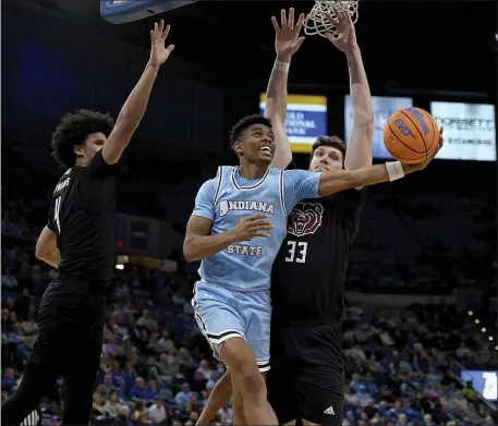  ?? JOSEPH C. GARZA — THE TRIBUNE-STAR VIA AO ?? Indiana State’s balanced scoring, a free-flowing offense and a goggled big man has the program off to one of its best starts in years and ranked for the first time since Larry Bird.