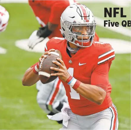  ??  ?? For as much buzz as there has been around Zach Wilson for No. 3, quarterbac­k Justin Fields, above, makes the most sense for the 49ers.