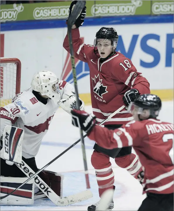  ?? — GETTY IMAGES FILES ?? ‘I think he (Jake Virtanen, centre) has a unique skill set,’ Canuck general manager Jim Benning says of Virtanen. ‘The game has got fast. More so this year. It’s hard to get to the net again. But he has the size and strength to get there.’