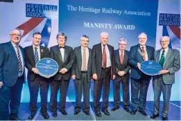  ??  ?? Representa­tives from the swanage Railway and RPsi celebrate their respective Peter Manisty awards on February 10.