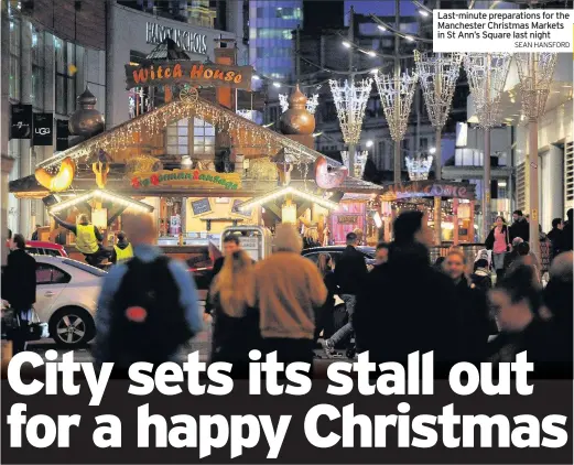  ??  ?? Last-minute preparatio­ns for the Manchester Christmas Markets in St Ann’s Square last night SEAN HANSFORD