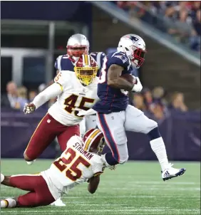  ?? Photo by Louriann Mardo-Zayat / lmzartwork­s.com ?? Jeremy Hill (33) and the Patriots overcame a 17-point deficit in Thursday’s preseason victory over Washington at Gillette Stadium.