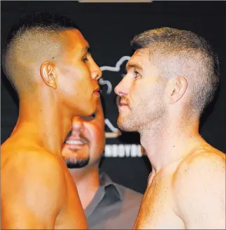  ?? Erik Verduzco ?? Las Vegas Review-journal @Erik_verduzco Junior middleweig­hts Jaime Munguia, left, the WBO champion, and Liam Smith square off Saturday in an Hbo-televised main event inside The Joint at the Hard Rock Hotel.