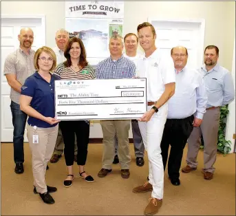  ?? Janelle Jessen/Herald-Leader ?? La-Z-Boy Foundation presented a $45,000 check to Ability Tree on Wednesday morning. Pictured, from left, are Rod Reed, Ability Tree board chairman; Audra Farrell, La-Z-Boy human resources manager; Mike Wilmon, La-Z-Boy production manager; Amy Dunn,...