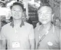  ??  ?? BUDDIES - Johnny Que (left) with friend Toto Barcelona of Harbest Agribusine­ss Corporatio­n.