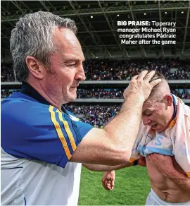  ??  ?? BIG PRAISE: Tipperary manager Michael Ryan congratula­tes Pádraic Maher after the game