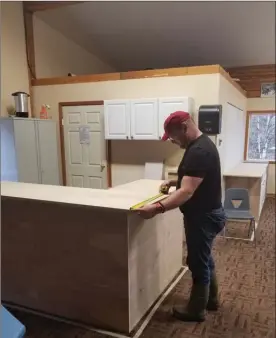  ?? Special to The Okanagan Weekend ?? Telemark Nordic Club skiers and snowshoers will notice a few changes this season such as renovation­s to add new tables and counter space to the chalet. Nigel Duxbury worked on the new counter space in the Telemark Chalet.