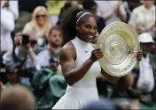  ?? BEN CURTIS — THE ASSOCIATED PRESS FILE ?? Serena Williams holds her trophy after winning the women’s singles final against Angelique Kerber at Wimbledon in 2016.