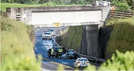  ?? SIMON O’CONNOR/STUFF ?? The collision took place on SH3 under the railway overbridge near the intersecti­on with Rugby Rd, Tariki.