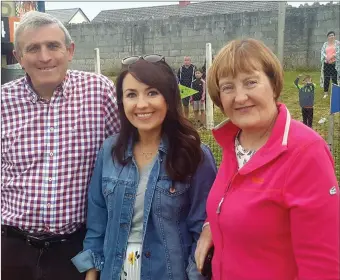  ??  ?? All smiles while attending the pig race at the Ballyheigu­e Summer festival last week were the local Reidy family Michael Anthony,Anne Marie and Beth.Photo Moss Joe Browne.