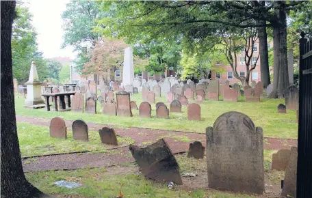  ??  ?? The Ancient Burying Ground in downtown Hartford is seen in 2019. Preservati­onists are calling for regional and statewide action to address deteriorat­ing cemeteries.
