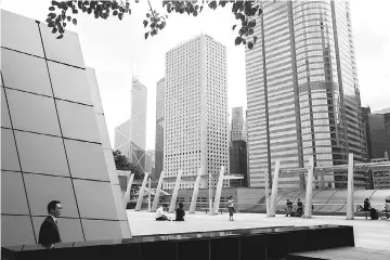  ?? — AFP photo ?? A general view of Jardine House that houses the offices of the law firm Appleby in Hong Kong on November 8. The Paradise Papers documents, which are mainly from the offshore law firm Appleby, have been shared with internatio­nal media via the US-based...