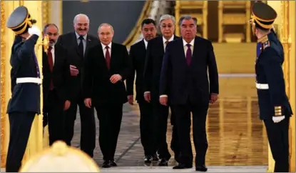  ?? ALEXANDER NEMENOV / REUTERS ?? From left: Armenian Prime Minister Nikol Pashinyan, Belarusian President Alexander Lukashenko, Russian President Vladimir Putin, Kyrgyzstan’s President Sadyr Japarov, Kazakhstan’s President Kassym-Jomart Tokayev and Tajikistan’s President Emomali Rakhmon enter the hall for a summit of the leaders of the Collective Security Treaty Organizati­on member states at the Kremlin, in Moscow, on May 16.