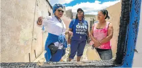  ?? Picture: WERNER HILLS ?? SUPPORTING WOMEN: Team One South Africa’s Nomafrench Mbombo, with Eastern Cape Premier Campaign’s Georgina Faldtman, embarked on a visit to engage with residents of Tiryville. Here Mbombo, left, and Faldtman talk to Sophie Snyers