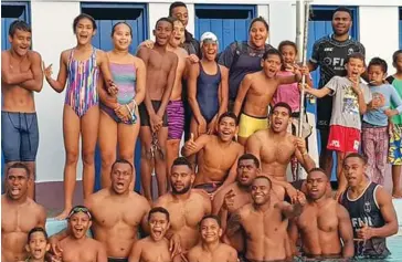  ??  ?? Some members of the Fiji Airways Fjian 7s players with the Marlin Blues swimming club.