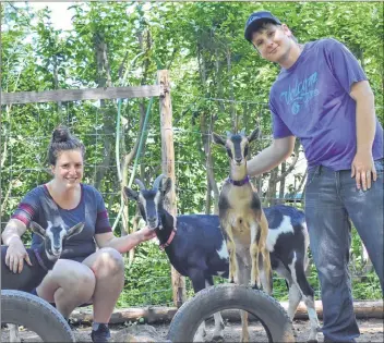  ?? ASHLEY THOMPSON ?? Jasmine Lomond and Brendon Meister of Maritime Treasure Goat Therapy have started a family business that’s proved to be a life-changing venture for Meister. They are pictured here with goats Coco, Pumpkin and Squash.