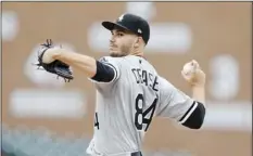  ??  ?? Chicago White Sox starting pitcher Dylan Cease throws during the first inning of the first game of a baseball doublehead­er against the Detroit Tigers, on Tuesday, in Detroit. AP PHOTO/CARLOS OSORIO