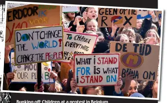  ??  ?? Bunking off: Children at a protest in Belgium and, left, an advert for Friday’s UK protest