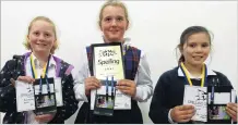  ??  ?? Winning form . . . Sacred Heart Primary School pupils (from left) Chloe Gordon (10), Annie Henderson (11) and Anastasia Burrell (10) celebrate their win in the years 5 and 6 section.