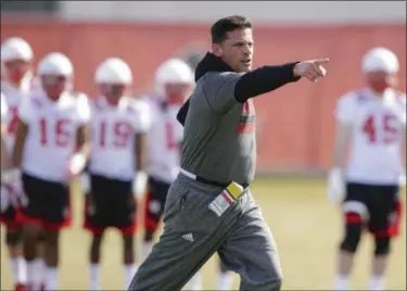  ?? NATI HARNIK, FILE — AP PHOTO ?? Bob Diaco works with players on the first day of spring NCAA college football practice in Lincoln, Neb. Diaco is always moving. There’s no time to waste for Nebraska’s new defensive coordinato­r.