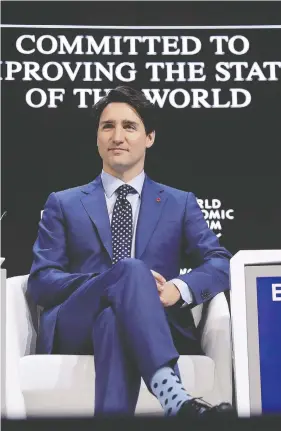  ?? MARKUS SCHREIBER / THE ASSOCIATED PRESS FILES ?? While the wave of populism that elected Conservati­ves elsewhere is said to be coming to an end, Prime Minister Justin Trudeau is adept at practising populist techniques.