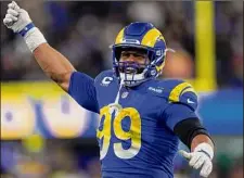  ?? Mark J. Terrill / Associated Press ?? Rams defensive end Aaron Donald will make $65 million over the next two seasons in his reworked contract.