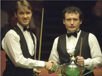  ??  ?? Stephen Hendry, left, and Jimmy White will be renewing their rivalry today when they meet in the first qualifying round of the World Championsh­ips