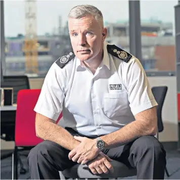  ?? ?? Former Army captain Andy Rose, above, is the commission­er of the London Fire Brigade; lessons learnt from the Grenfell fire tragedy, left, have forged his approach to his new role