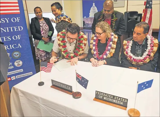  ?? Picture: FORUM FISHERIES AGENCY ?? Ten Pacific parties signed the 2024 access arrangemen­t under the Tuna Treaty with the US yesterday.