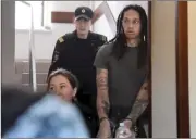  ?? AP photo ?? WNBA star Brittney Griner is escorted to a courtroom for a hearing in Russia on Monday.
