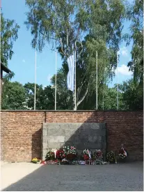  ??  ?? DEATH WALL in Auschwitz I, where prisoners were shot. The wall is in a yard between Barrack (Block) 10, where medical experiment­s were conducted, and Block 11, the prison block where “erring” prisoners were held in small cells for punishment or death through starvation.