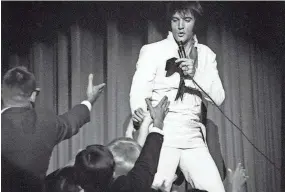  ?? ELVIS PRESLEY ENTERPRISE­S ?? Elvis Presley on stage in 1969.