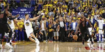  ?? EZRA SHAW / GETTY IMAGES ?? In the closing seconds in Game 1 of the 2018 NBA Finals, J.R. Smith grabbed an offensive rebound after a missed foul shot and dribbled out the clock to end regulation, thinking the Cavs were ahead when they were tied.