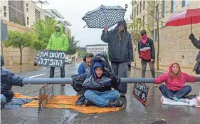  ?? OHAD ZWIGENBERG/AP ?? Tens of thousands of Israelis have taken to the streets of Jerusalem over the past two months to protest plans by Prime Minister Benjamin Netanyahu’s government to overhaul the judicial system.