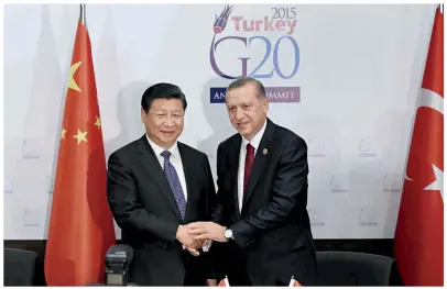  ??  ?? Chinese President Xi Jinping meets with his Turkish counterpar­t Recep Tayyip Erdogan in Antalya, Turkey on November 14, 2015.