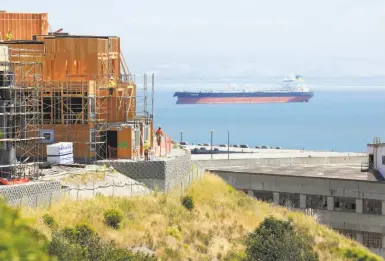  ?? Lea Suzuki / The Chronicle ?? Constructi­on continues in May on Parcel A at the Hunters Point shipyard, which was declared safe for housing.