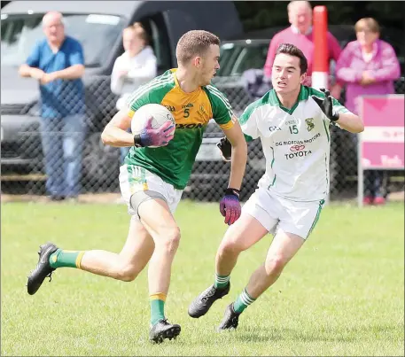  ??  ?? Duleek/Bellewstow­n’s Shane Crosby looks to go past the challenge of Stephen Fenton (Donaghmore/Ash) during Sunday’s IFC match.