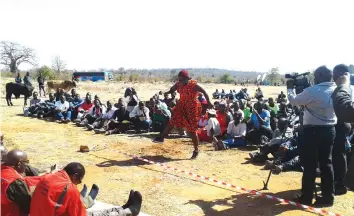  ??  ?? Some of the villagers celebrate the new developmen­ts in Chiadzwa at the tombstone erection ceremony held at Chitangazu­va Reburial Cemetery site where ZCDC is assisting villagers to properly rebury their deceased relatives on Wednesday