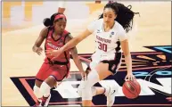  ?? Eric Gay / Associated Press ?? Stanford’s Haley Jones, right, drives up court Arizona’s Aari McDonald defends during the first half on Sunday in San Antonio.