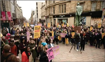  ??  ?? Members of the University and College Union gather to protest at the top of Buchanan Street