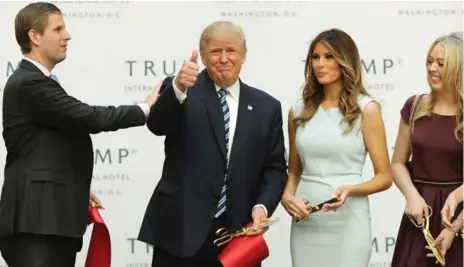  ?? CHIP SOMODEVILL­A/GETTY IMAGES ?? Less than two weeks before the U.S. election, Republican presidenti­al candidate Donald Trump took a break from campaignin­g to open his new hotel.