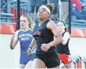  ?? MICHAEL MCLOONE / FOR THE JOURNAL SENTINEL ?? Waukesha South’s Armoni Brown wins the 100 meters on Thursday at Arrowhead High School.