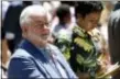  ?? CHRIS PIZZELLO — THE ASSOCIATED PRESS ?? Filmmaker George Lucas, left, and his wife Mellody Hobson listen to remarks at a news conference outside Los Angeles City Hall on Tuesday.